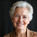 Portrait of an older woman with a kind expression, representing 'Maria L'.